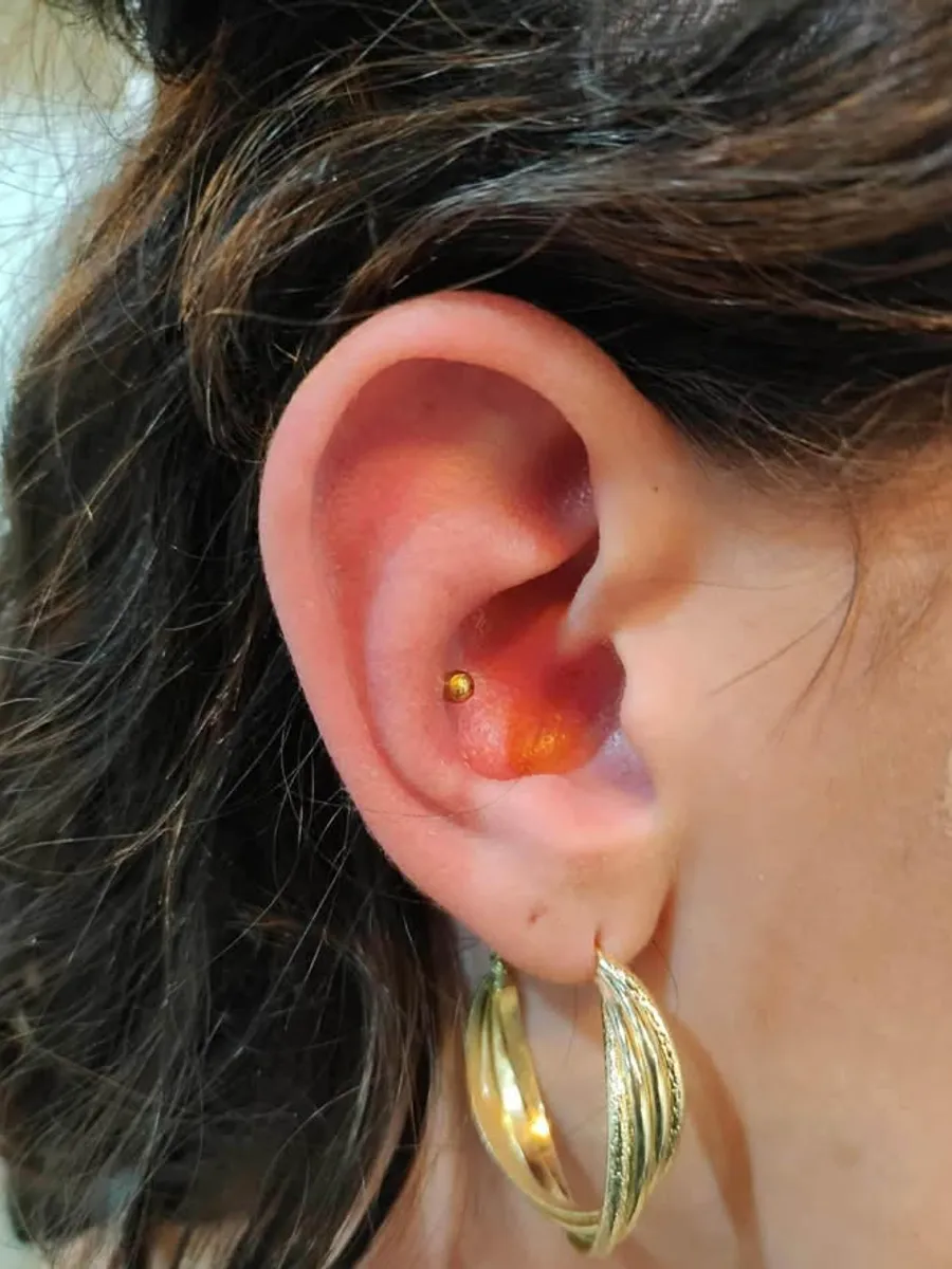Ear piercing by RUN INK Tattoo Bangkok