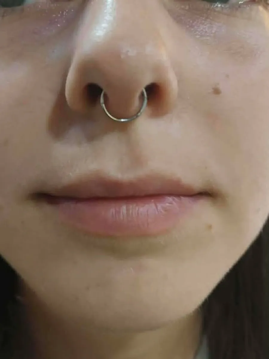 Septum piercing by RUN INK Tattoo Bangkok