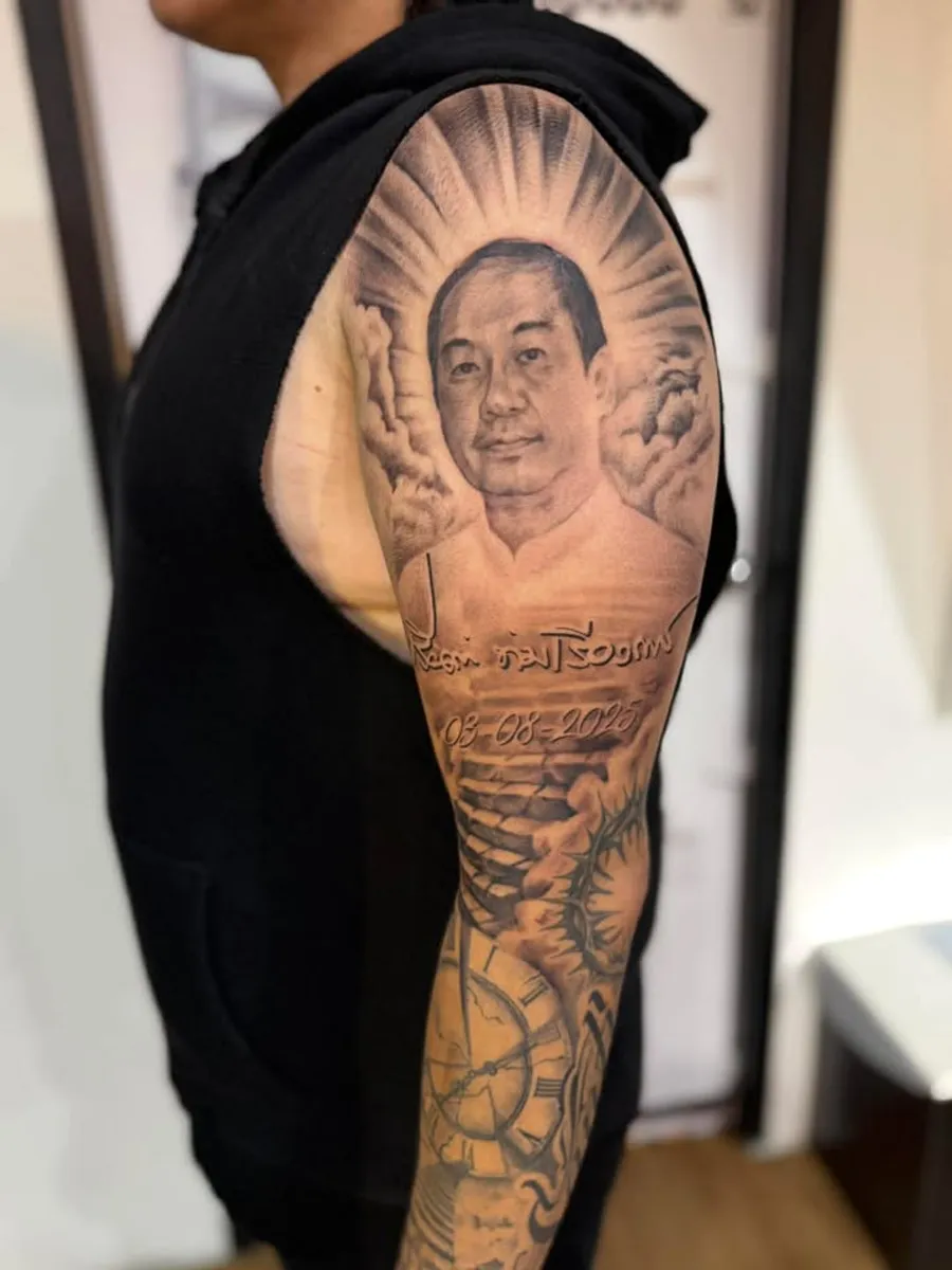 Realistic portrait tattoo on the arm by RUN INK Tattoo Bangkok