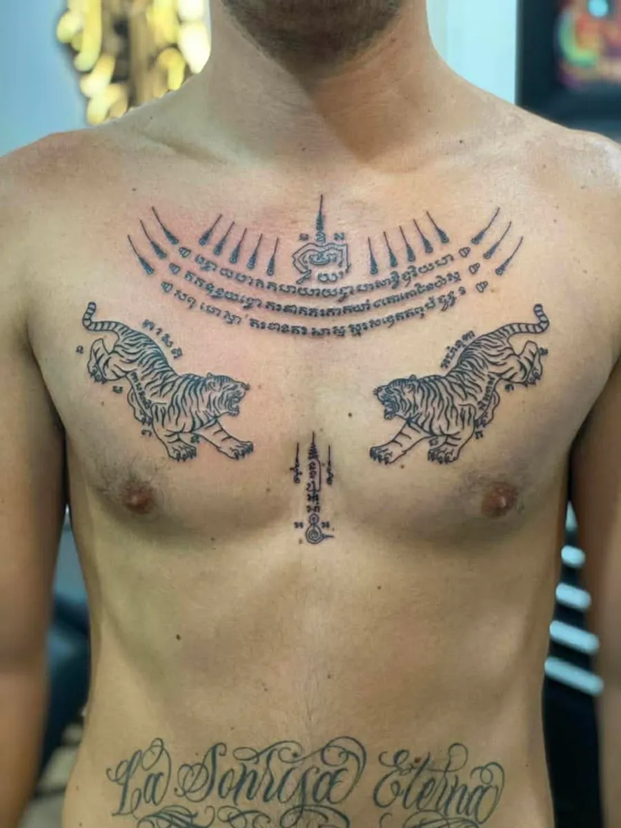 Twin tigers Sak Yant by RUN INK Tattoo Bangkok