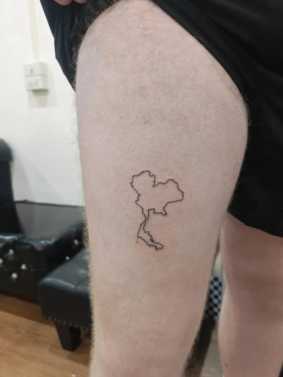 Fine Line map of Thailand tattoo by RUN INK Tattoo Bangkok