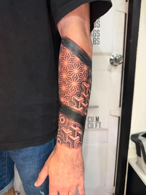 Black and Grey geometric forearm tattoo by RUN INK Tattoo Bangkok