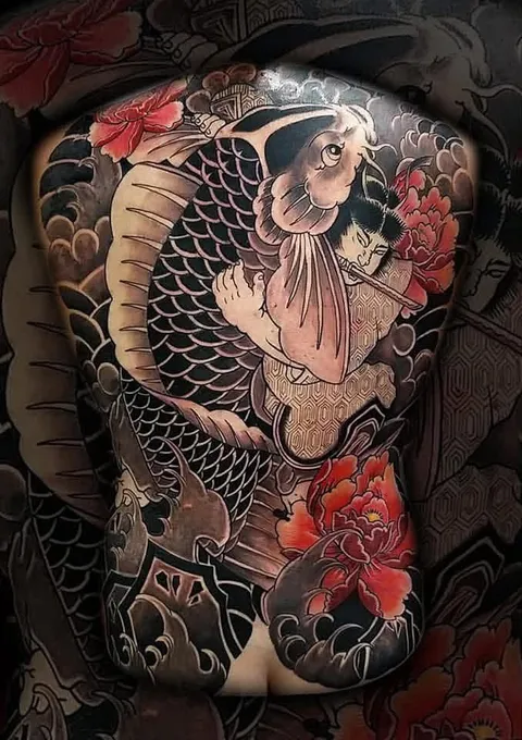 Japanese koi full backpiece tattoo by RUN INK Tattoo Bangkok
