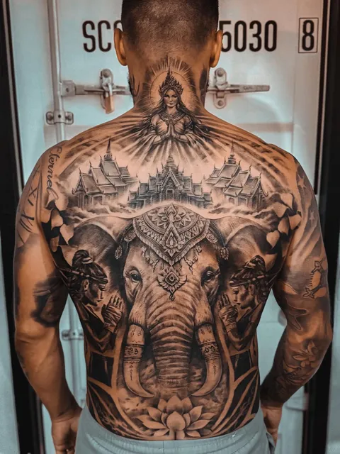 Realistic elephant and temple full back tattoo by RUN INK Tattoo Bangkok