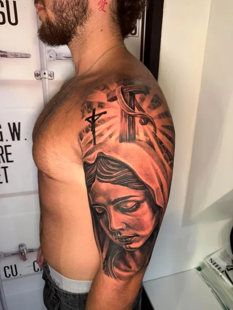 Realistic Virgin Mary arm tattoo by RUN INK Tattoo Bangkok