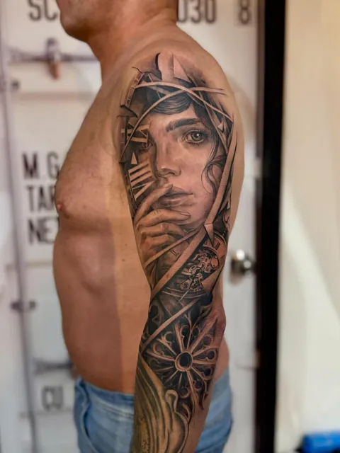 Realistic woman portrait full sleeve tattoo by RUN INK Tattoo Bangkok