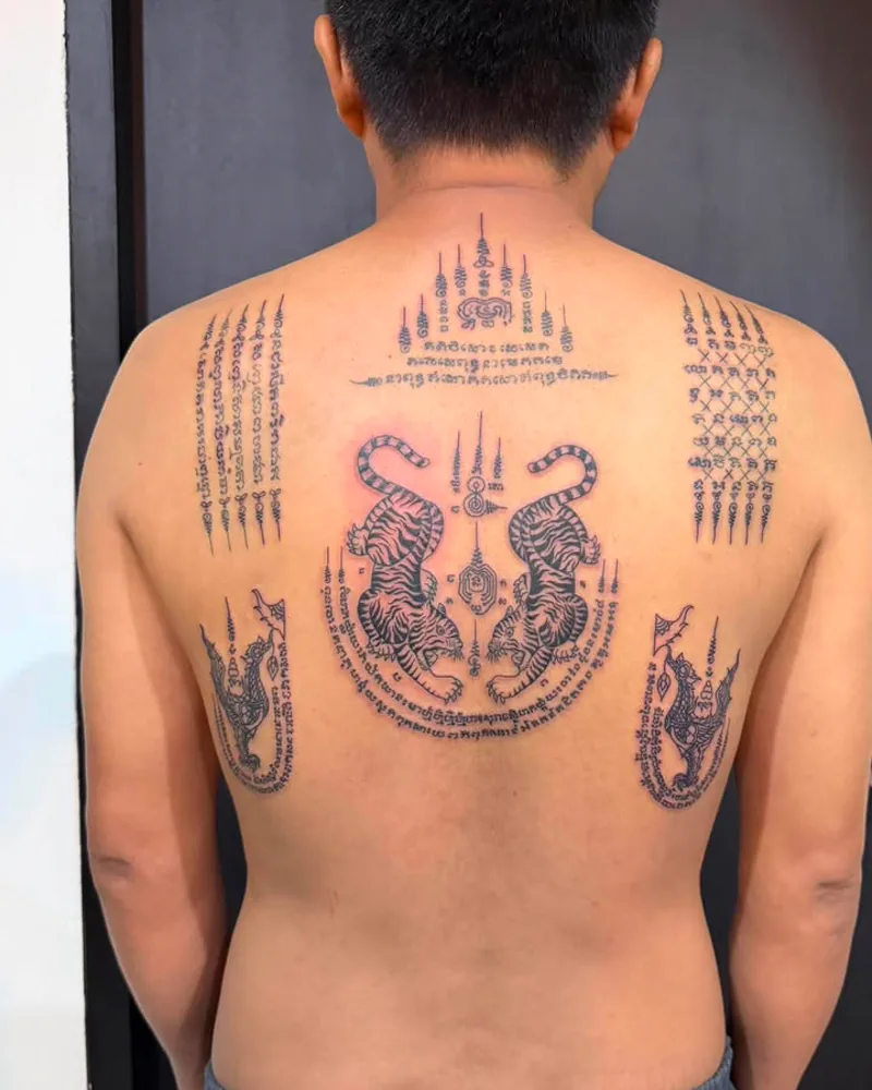 Sak Yant sacred Thai tattoo by RUN INK Tattoo Bangkok